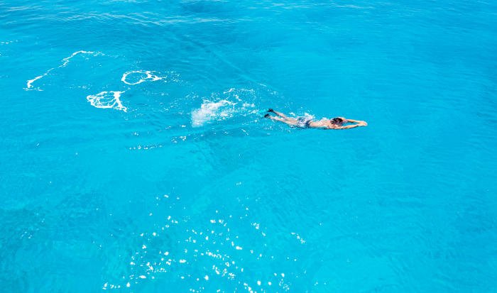 Robocarl swims in the sea.