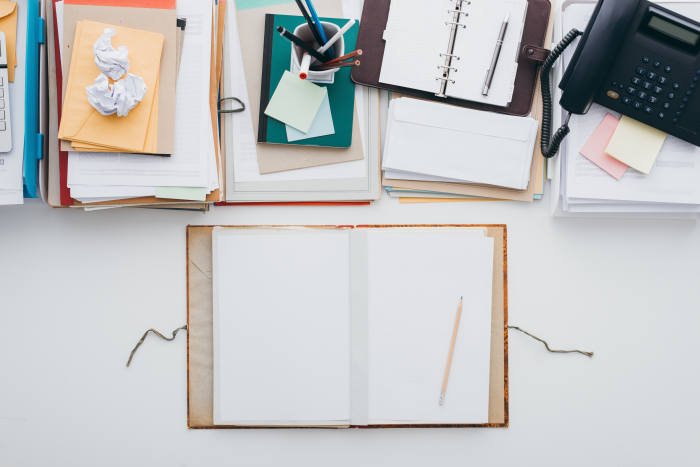 A messy desk is all you want to be productive and creative.